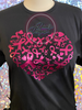 Multiple breast cancer ribbons in the shape of a heart in fuscia vinyl.