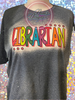 Dark Heather Bleached tee with Librarian in orange, yellow, green, blue, purple, and red colors.