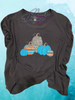 Black tee with five teal, orange, striped, leopard print pumpkins.