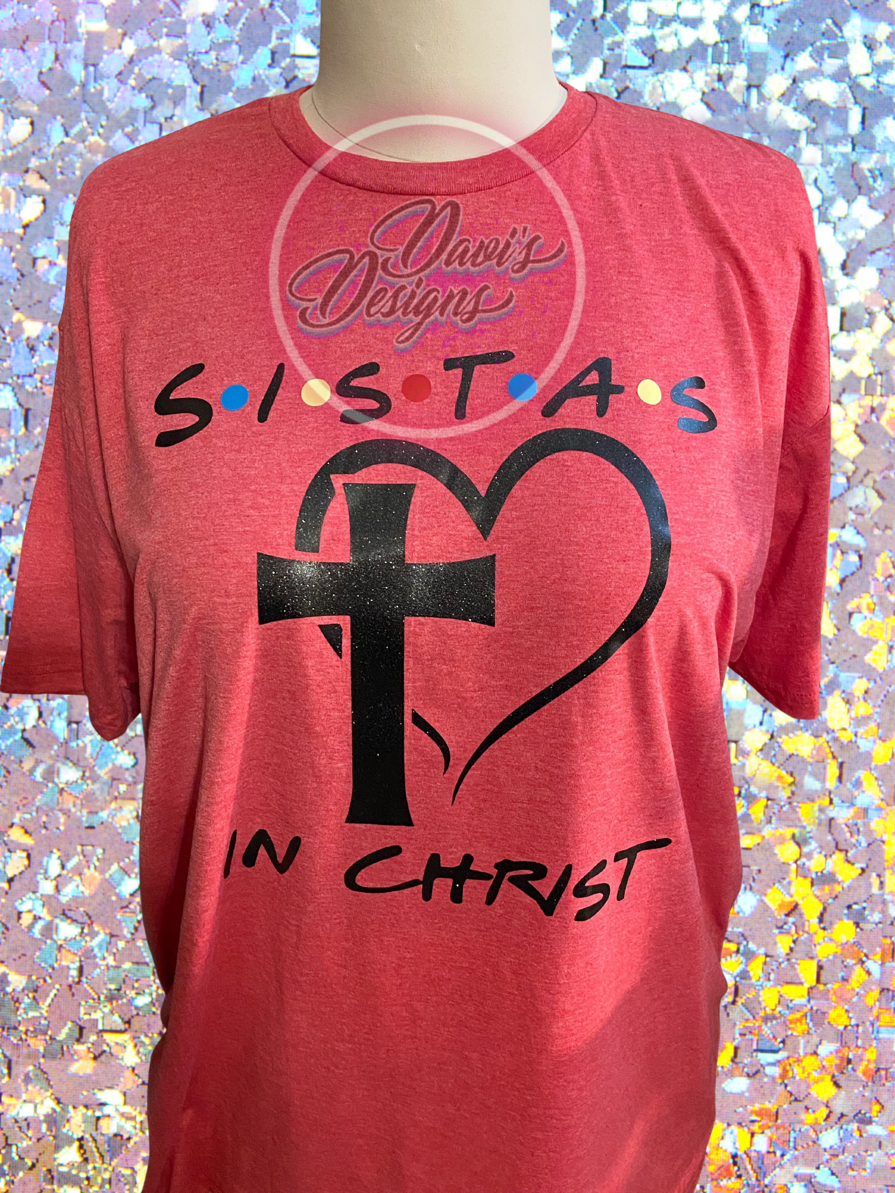 Heather Red shirt with Sistas in Christ in Black Glitter Vinyl.