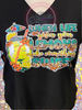 Black tee with green, yellow, and leopard print and lemonade in a jar of lemons that says When Life Give You Lemons Make Something Sweet.